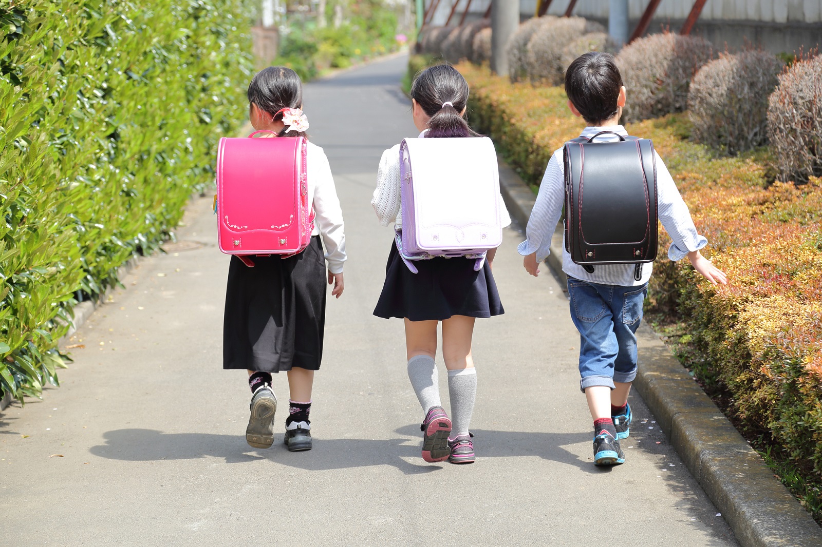 Children wearing randoseru backpacks