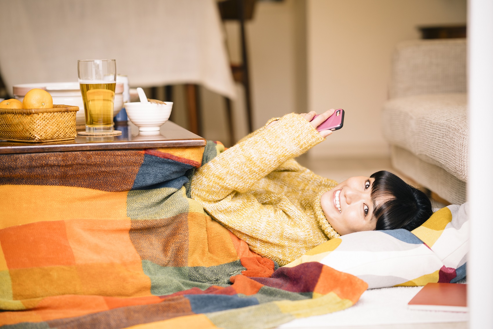 Sitting under a kotatsu